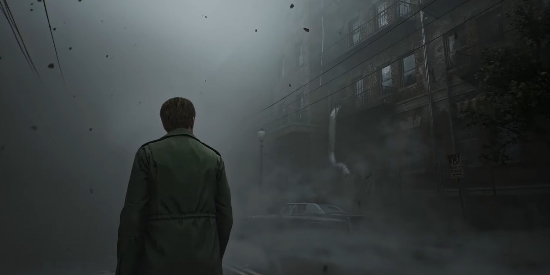 Image from the Silent Hill 2 remake trailer, showing James wandering through the foggy titular town.