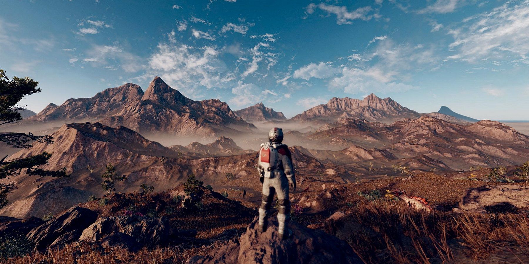 Image from Starfield showing an astronaut stood on a very rocky looking planet.