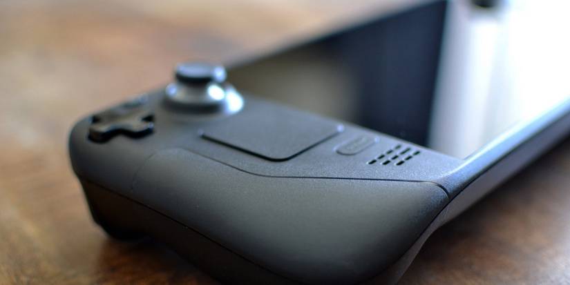 High quality photo of a Steam Deck on a wooden surface.