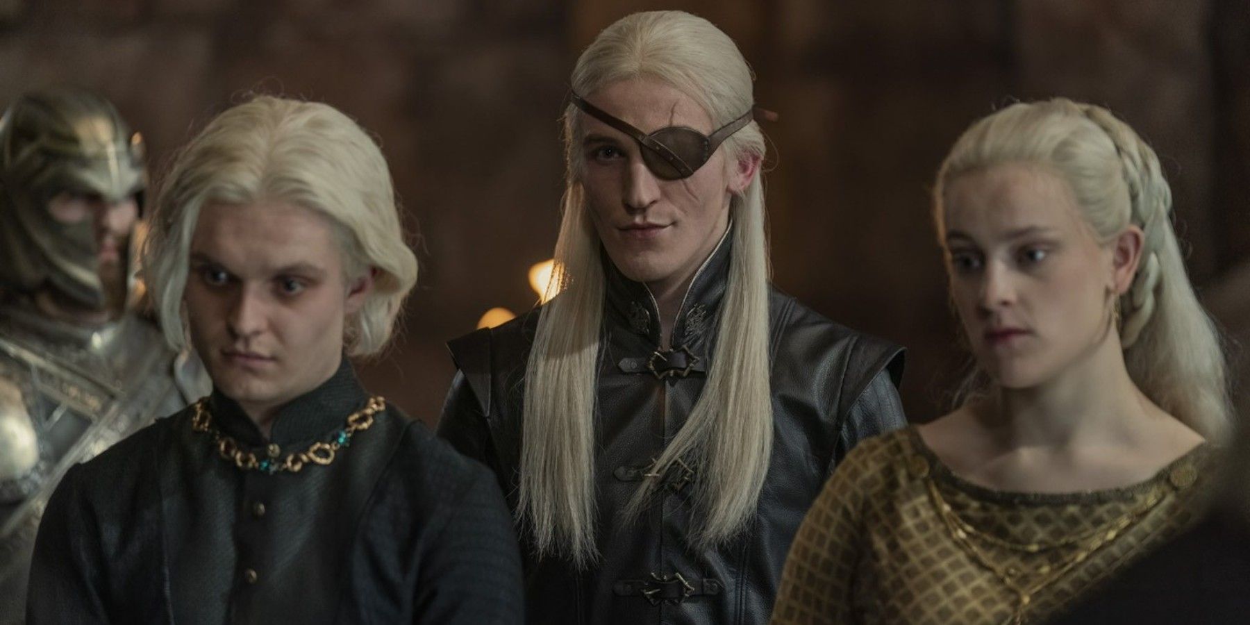 Aegon II (Tom Glynn-Carney), Aemond (Ewan Mitchell), and Helaena Targaryen (Phia Saban) in House of the Dragon