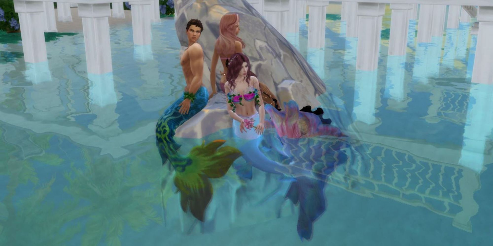 Three mermaids posing on a rock in The Sims 4