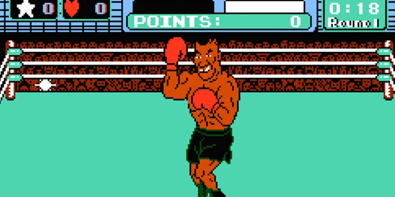 Screenshot of Mike Tyson in Boxing ring surrounded by fans in Punch-Out!!!