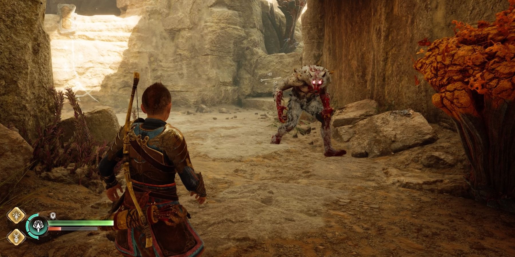 Atreus fights a Wulver in God of War Ragnarok