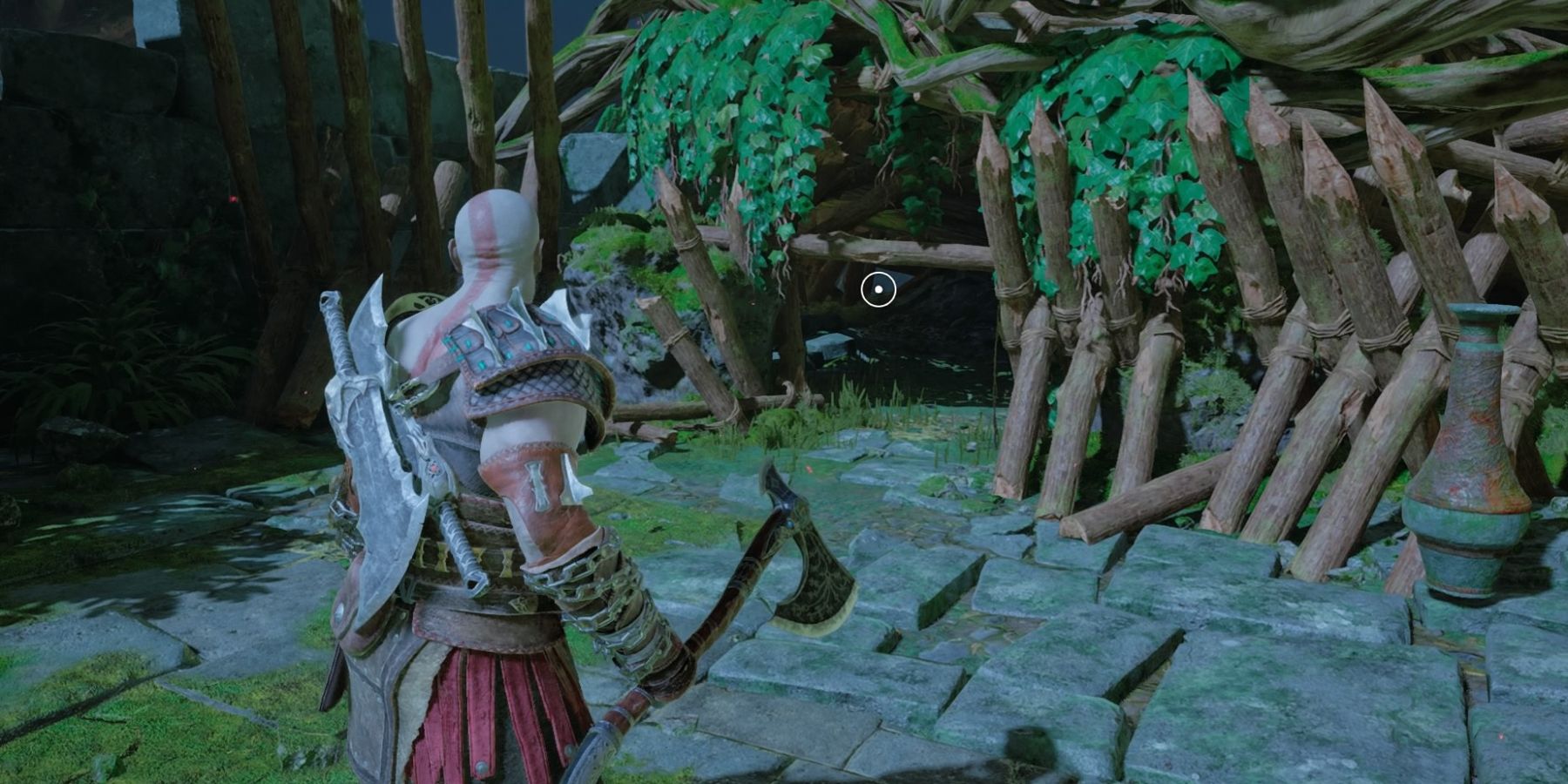 Kratos approaches a gap in a wooden fence in God of war Ragnarok
