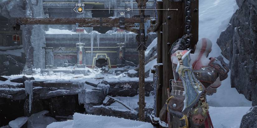 Kratos pulls a chain in God of War Ragnarok