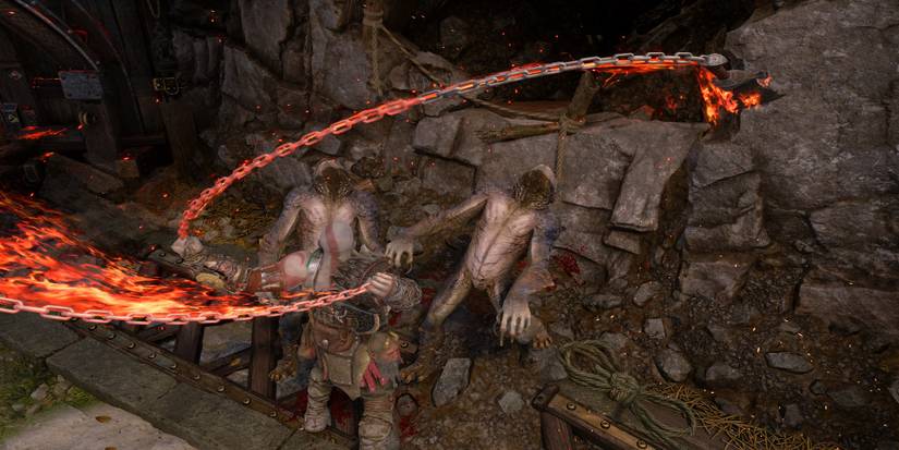 Fighting enemies in God of War Ragnarok