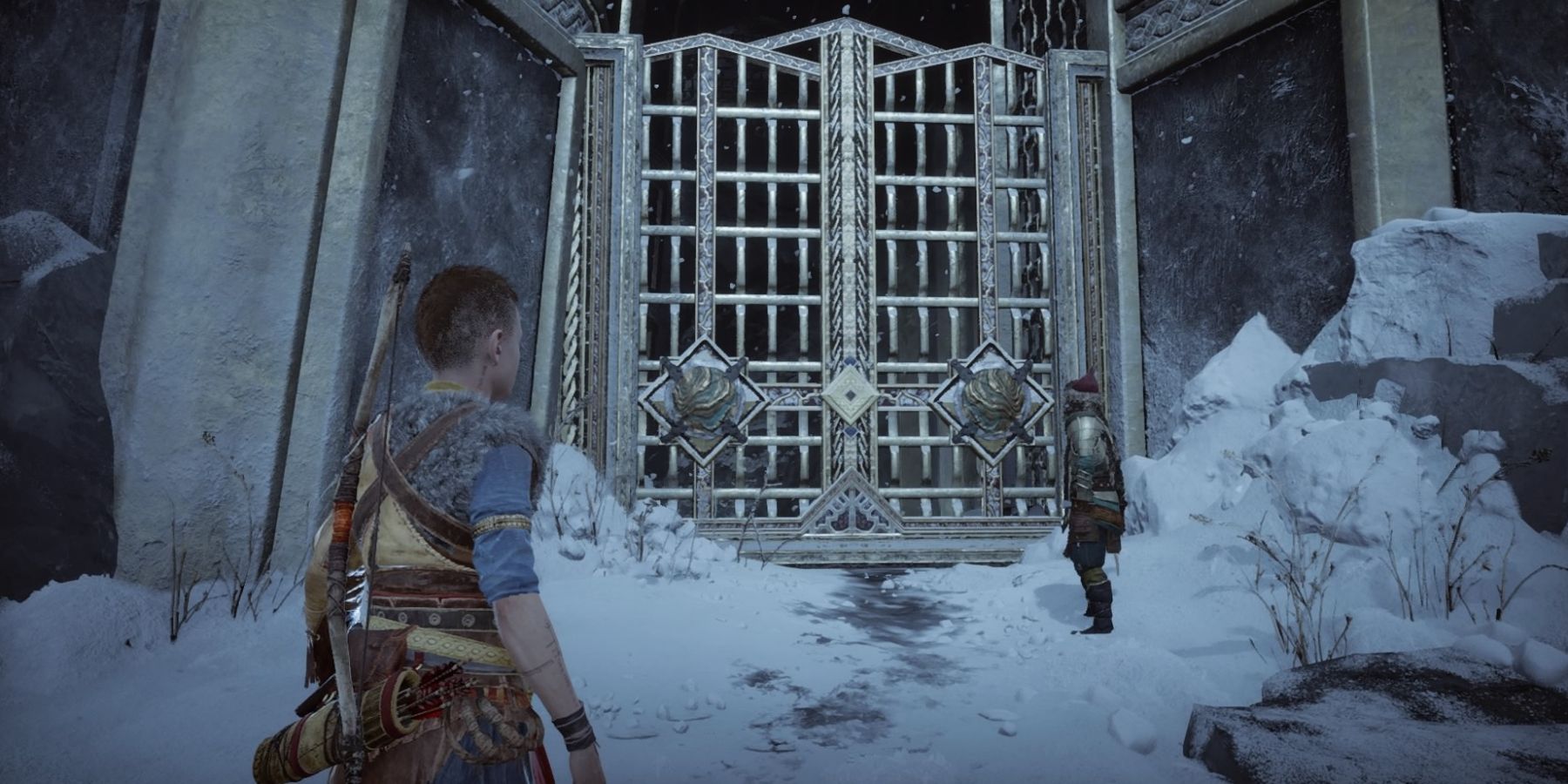 Atreus and Sindri face a gate in God of War Ragnarok