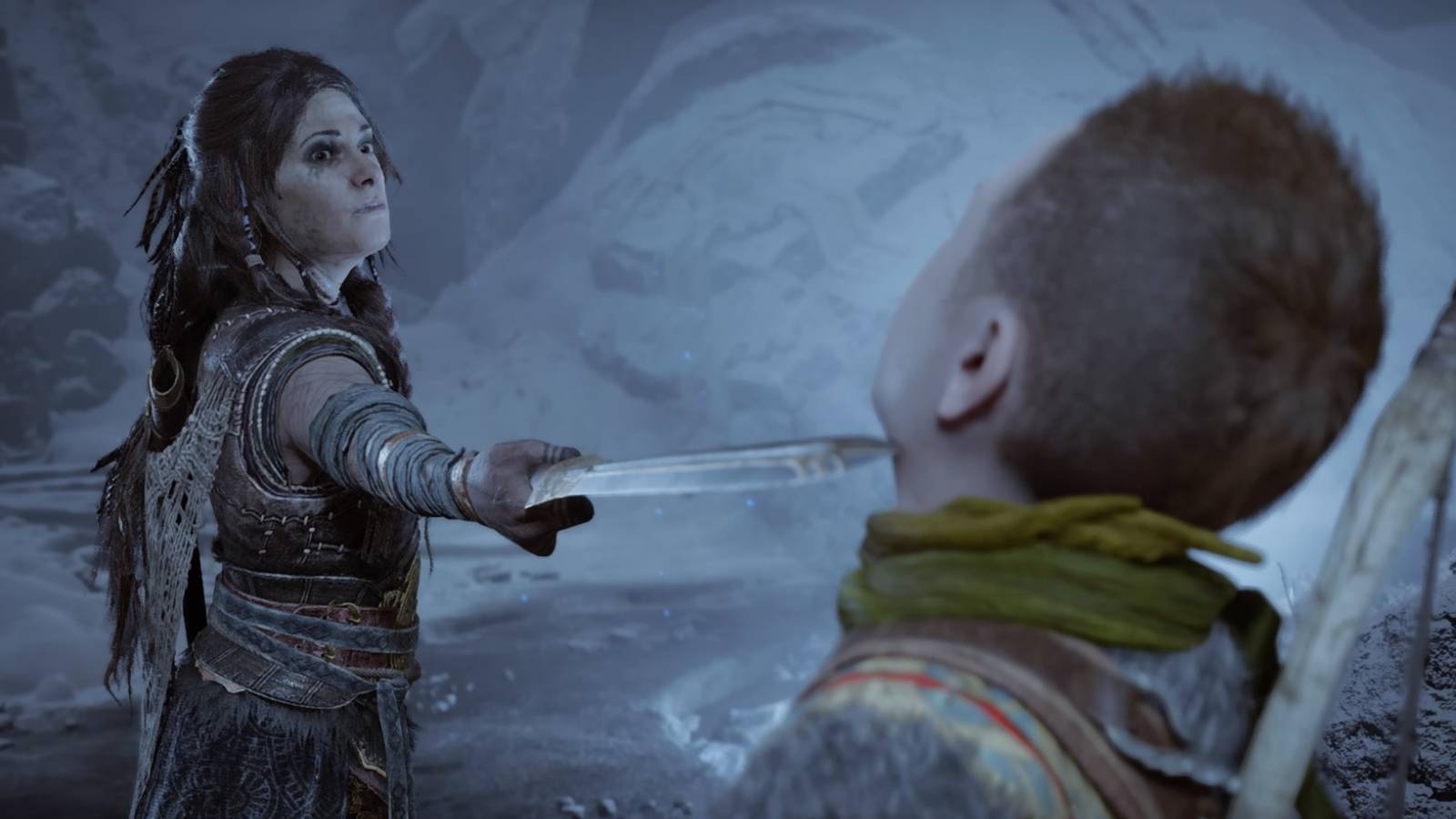 Freya positions her sword beneath Atreus' neck in God of War Ragnarok