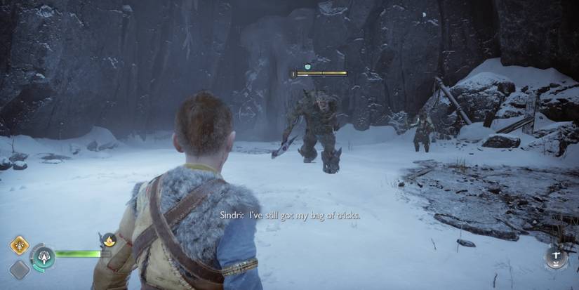 Atreus faces off against a giant Draugr in God of War Ragnarok
