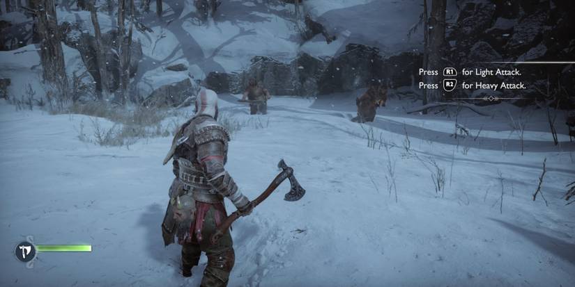 Kratos fights a group of raiders in God of War: Ragnarok