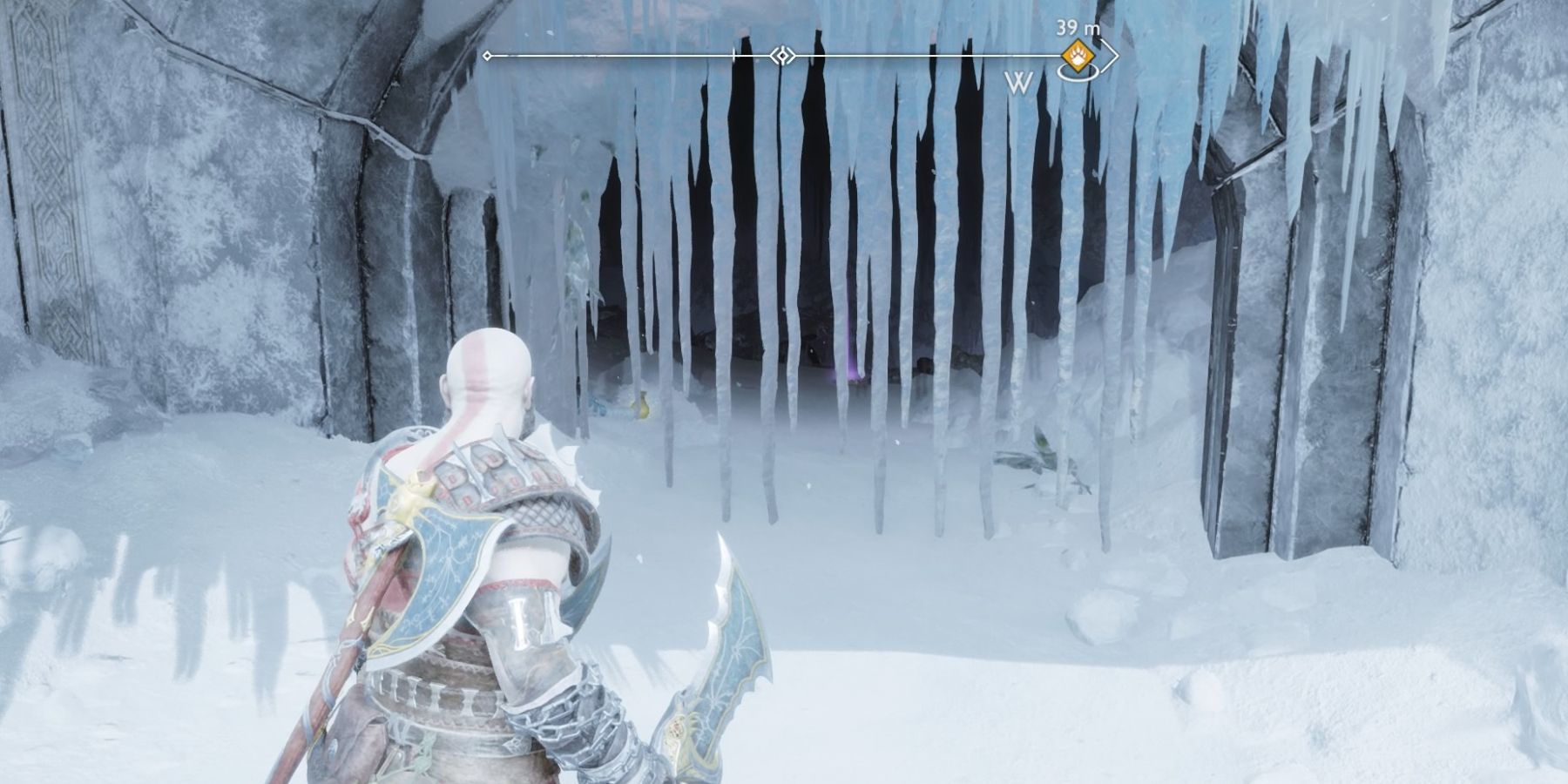 Kratos faces an doorway covered in ice in God of War Ragnarok