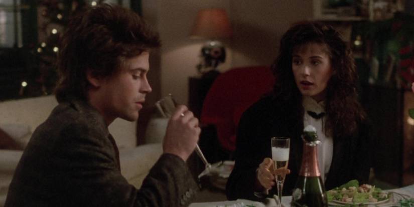 Rob Lowe and Demi Moore having a romantic dinner in About Last Night