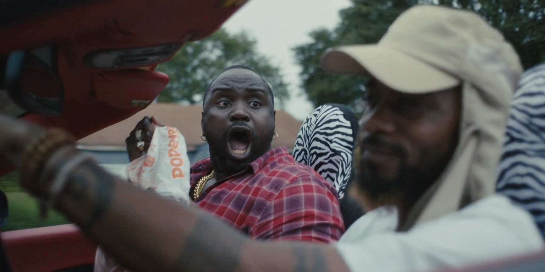 Brian Tyree Henry as Al screaming with Popeye's sandwich Atlanta finale