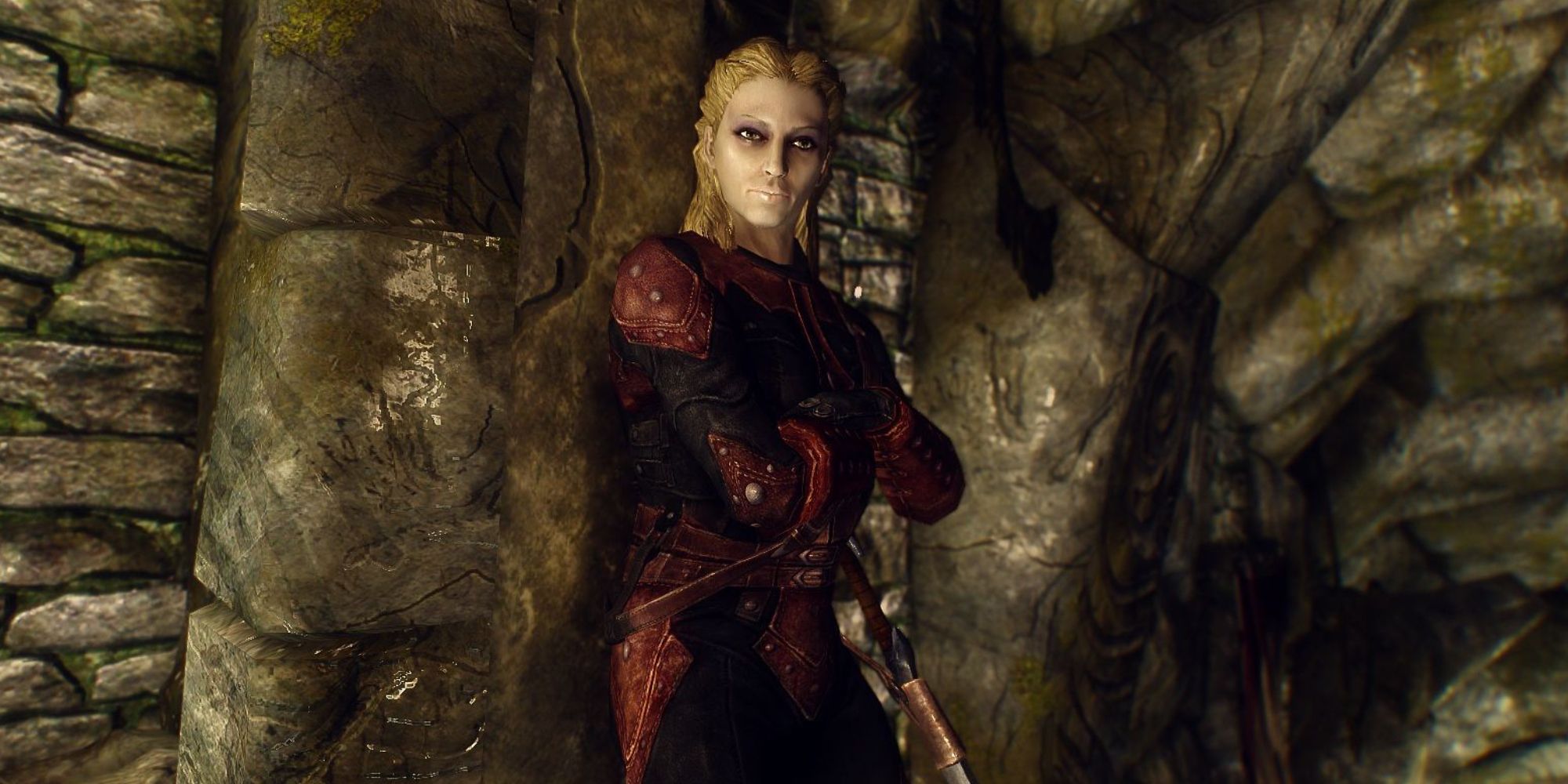 Astrid standing against a wall in the Falkreath Sanctuary