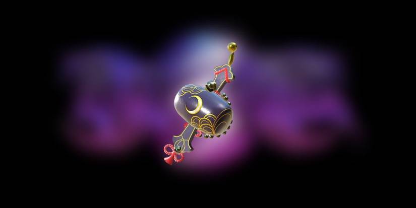 Bayonetta 3 Mallet of Rewards. A purple and gold mallet with a crescent moon logo and red string around the handle