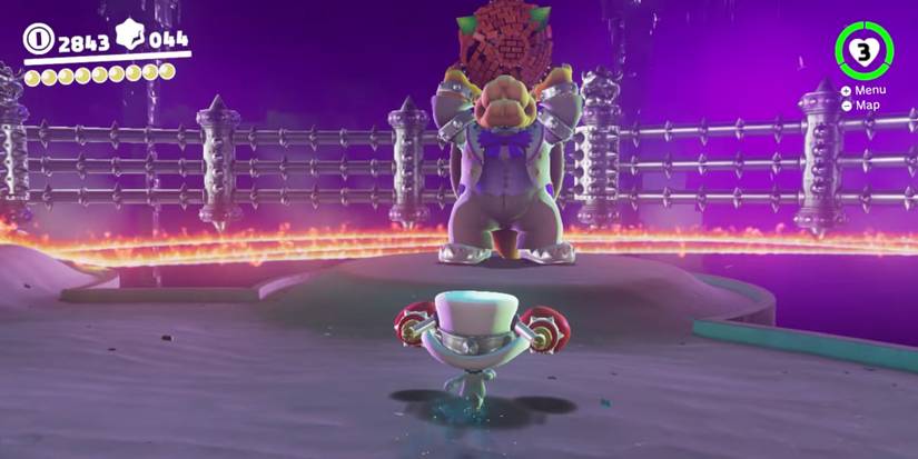 Bowser Throws A Rock At Mario In Super Mario Odyssey