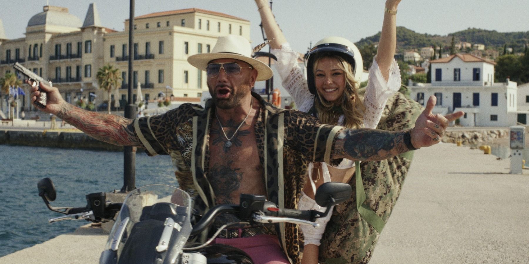 Dave Bautista and Kate Hudson on Motorcycle in Glass Onion: A Knives Out Mystery