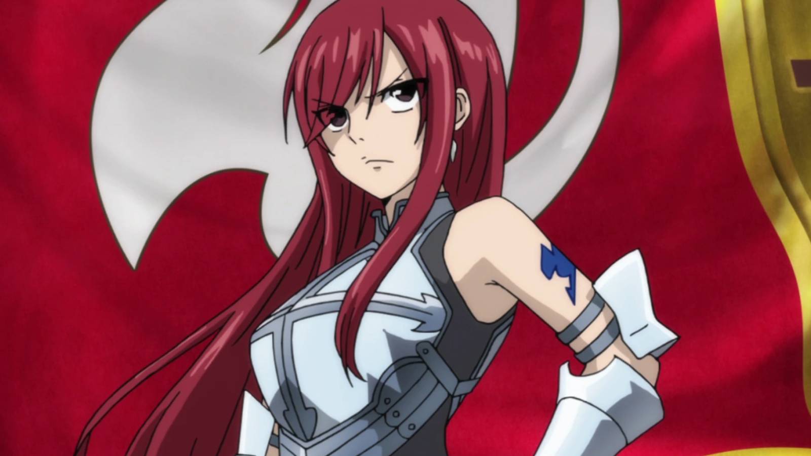 Erza Scarlet standing in front of the Fairy Tail flag as she is coronated as the seventh guild master.