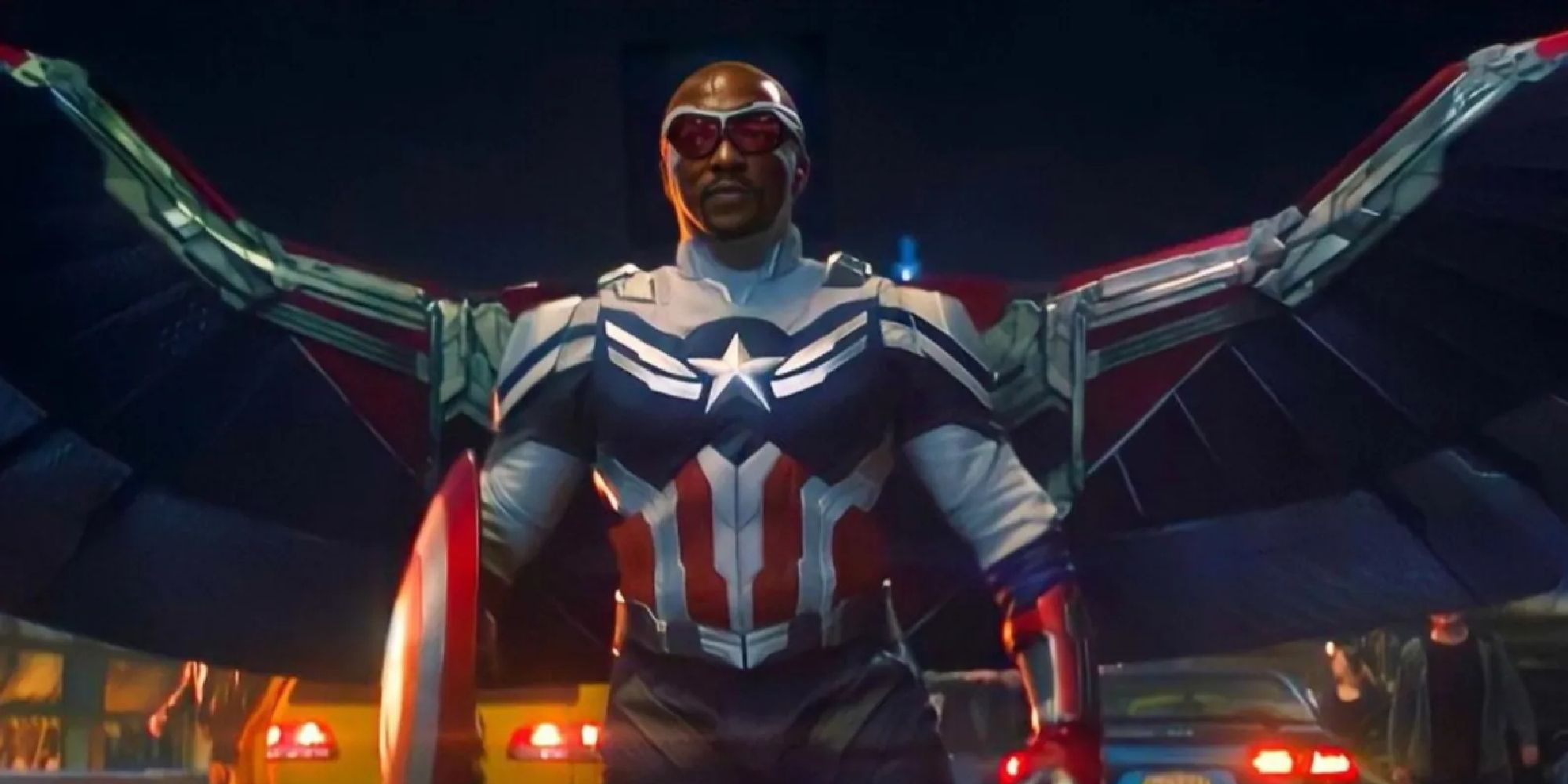 Sam Wilson donning his Captain America suit with wings and Steve's shield 