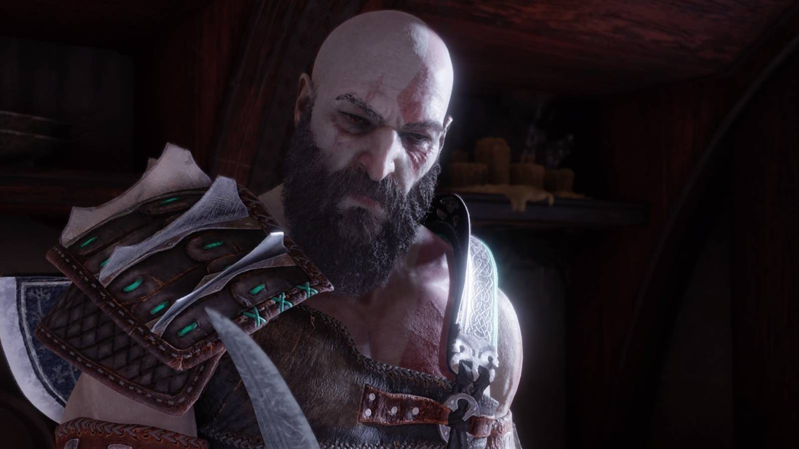 Kratos holds Atreus' knife in God of War Ragnarok
