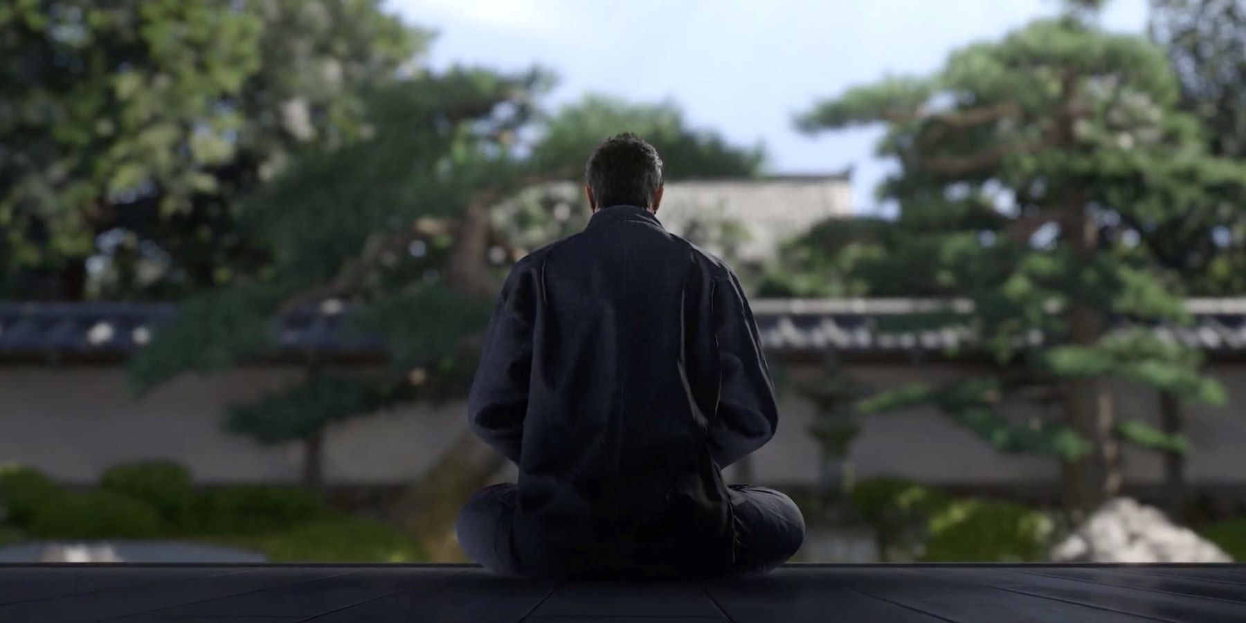 Kazuma Kiryu sits on a porch in the reveal trailer Like a Dragon Gaiden: The Man Who Erased His Name.