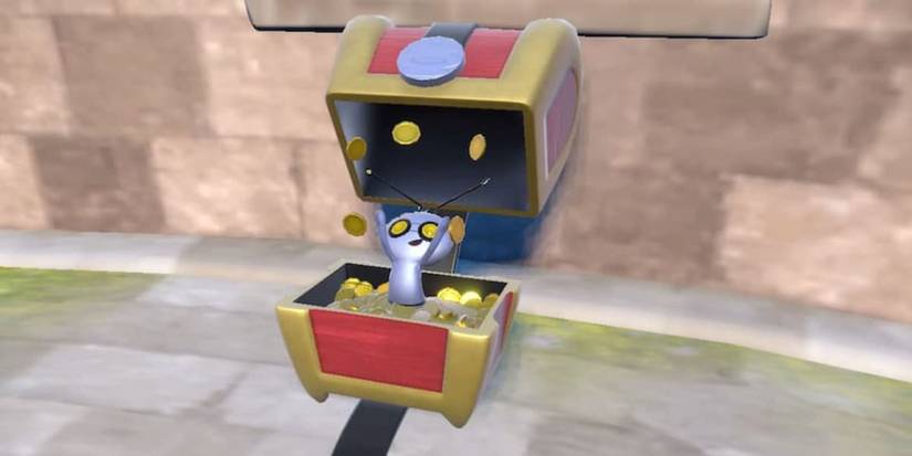 The pokemon Gimmighoul in its chest form in Pokemon Scarlet and Violet