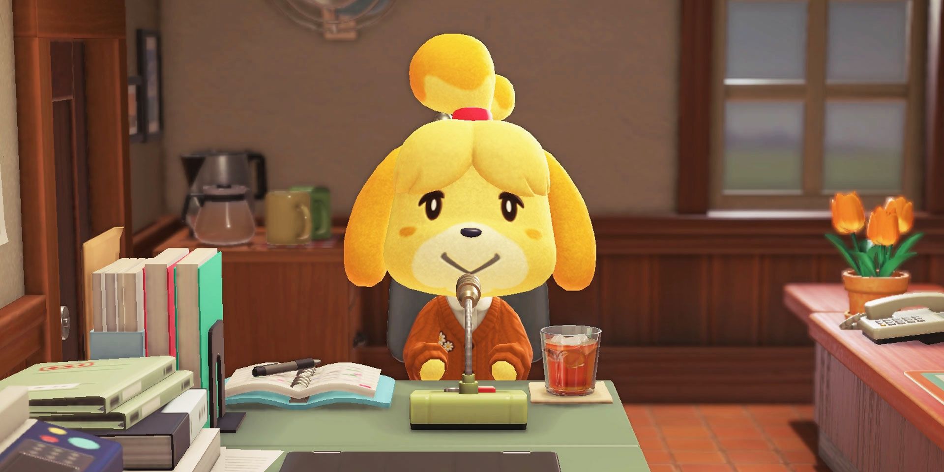 Isabelle sitting at her desk in Animal Crossing New Horizons