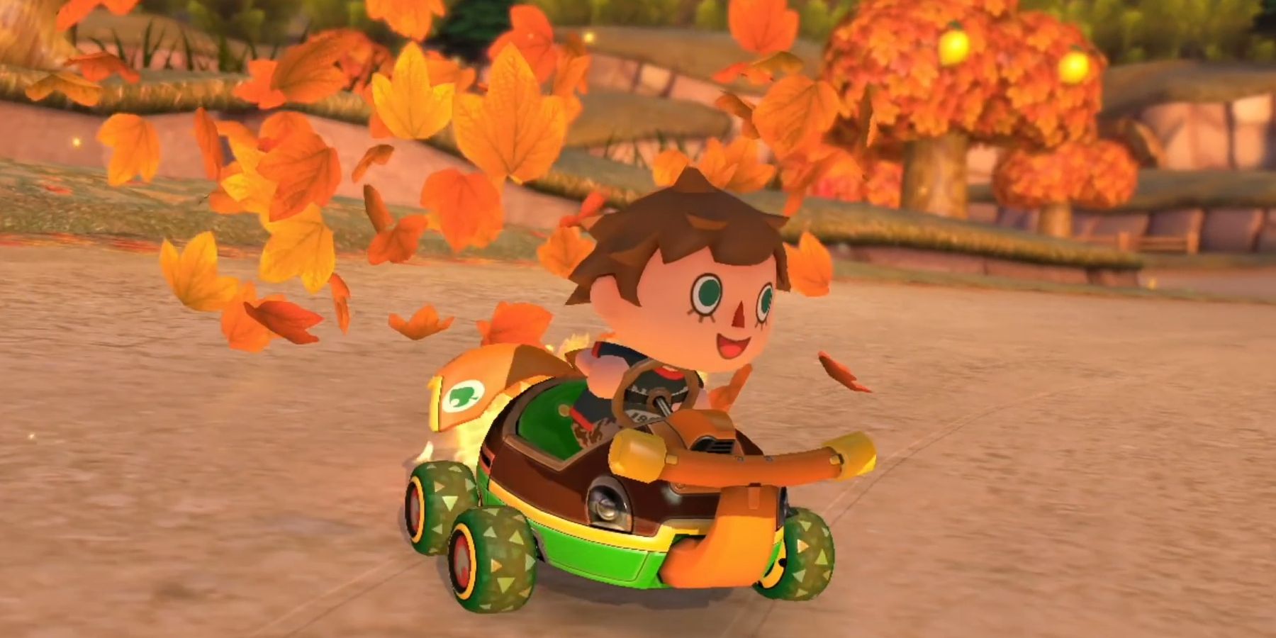Villager driving through a pile of leaves, which fly behind him. Image source: Nintendo of America on YouTube