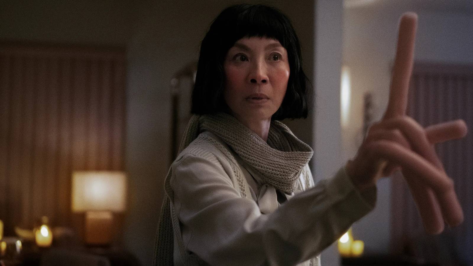 Michelle Yeoh with hot dog fingers in Everything Everywhere All at Once