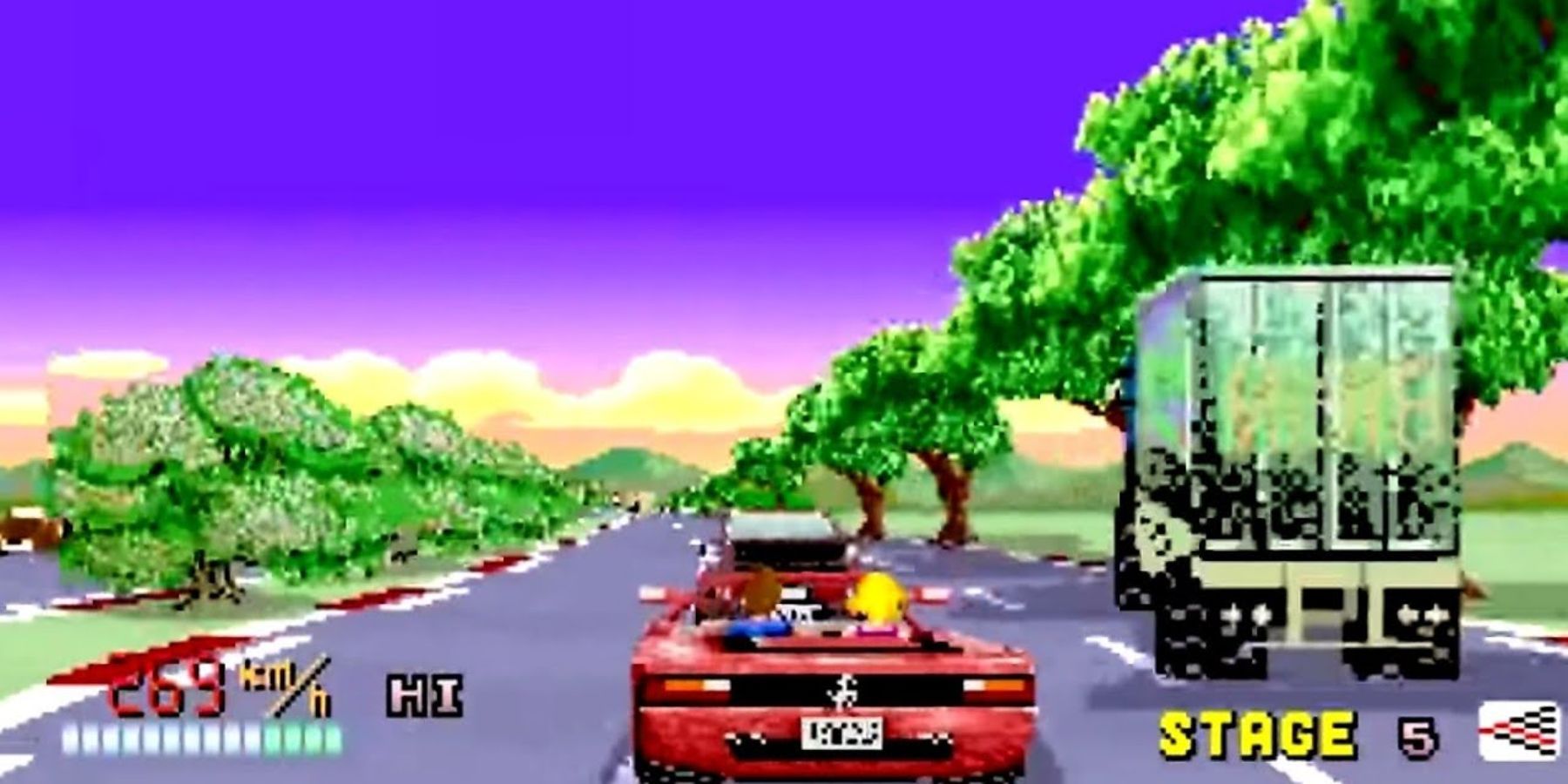 The player-controlled car driving down the road in Out Run