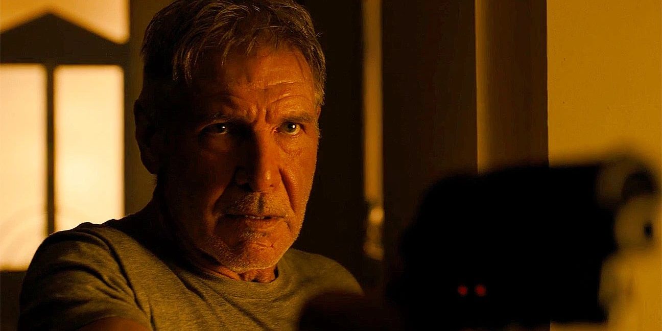 Rick Deckard with a gun in Blade Runner 2049
