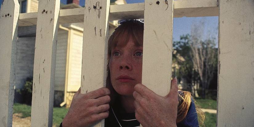 Sissy Spacek behind a picket fence in Carrie