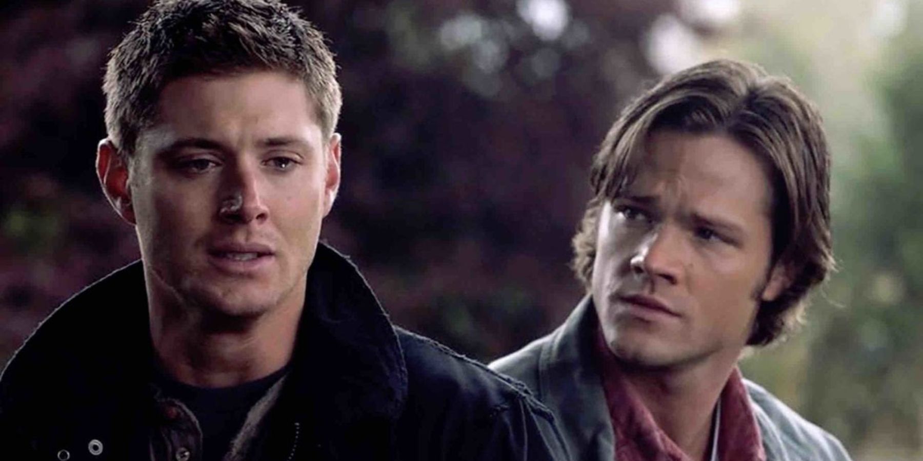 Dean and Sam looking upset and serious on Supernatural
