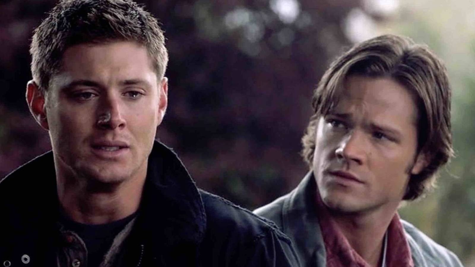 Dean and Sam looking upset and serious on Supernatural