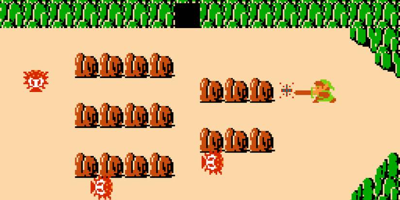 Link in an area with Octorocks and a cave in The Legend of Zelda