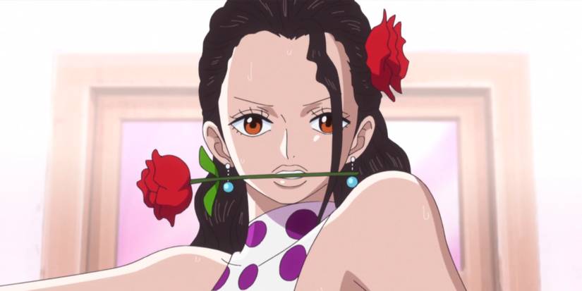 Viola with a flower between her lips