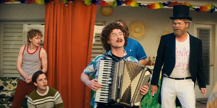 Daniel Radcliffe as Weird Al Yankovic singing at Hollywood party