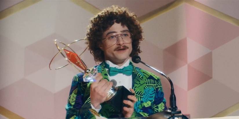 Daniel Radcliffe as Weird Al Yankovic accepting award