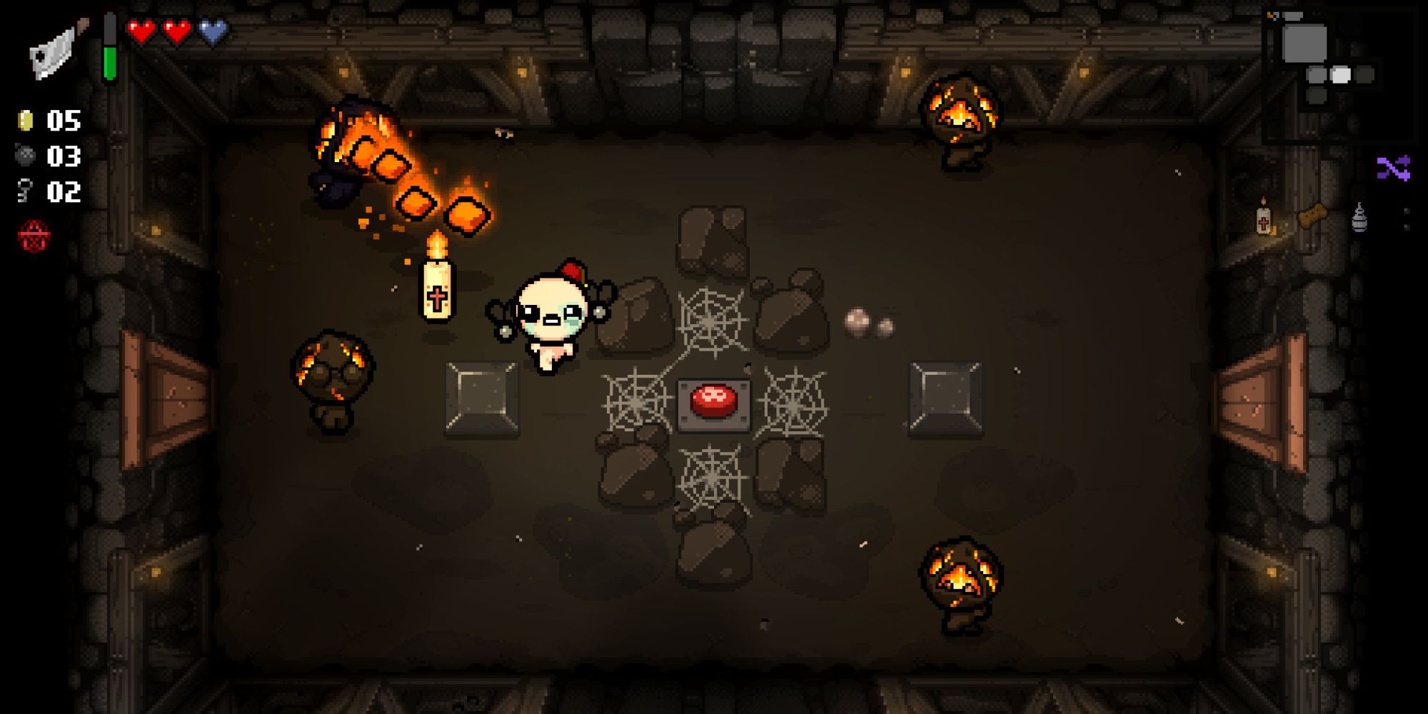 Binding of Isaac dungeon room with fire orbs and boulders