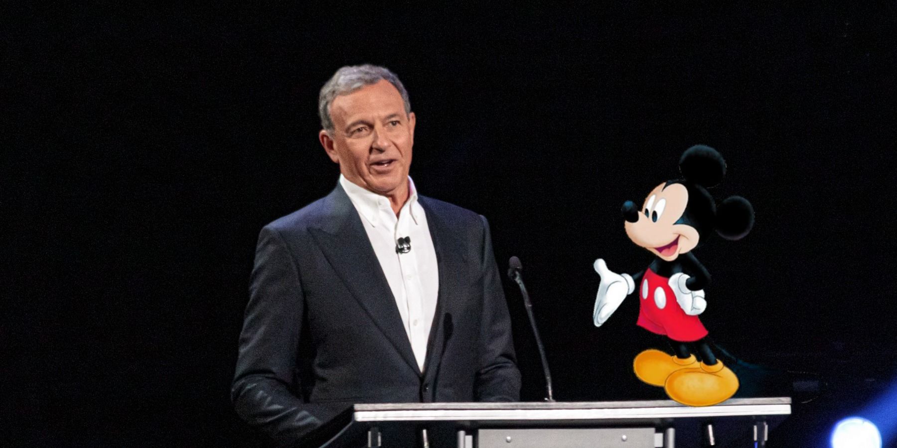 Bob Iger at DIsney Expo 2019 with Mickey Mouse cutout