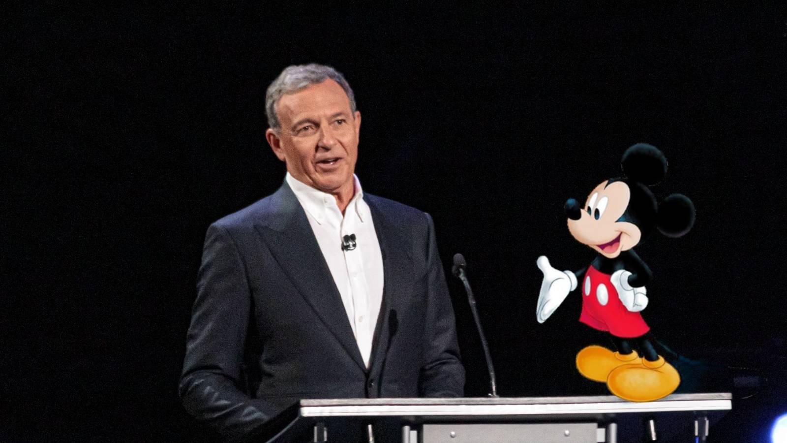Bob Iger at DIsney Expo 2019 with Mickey Mouse cutout