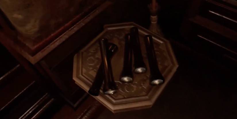 Player collects a flashlight from inside the Lewelin Manor