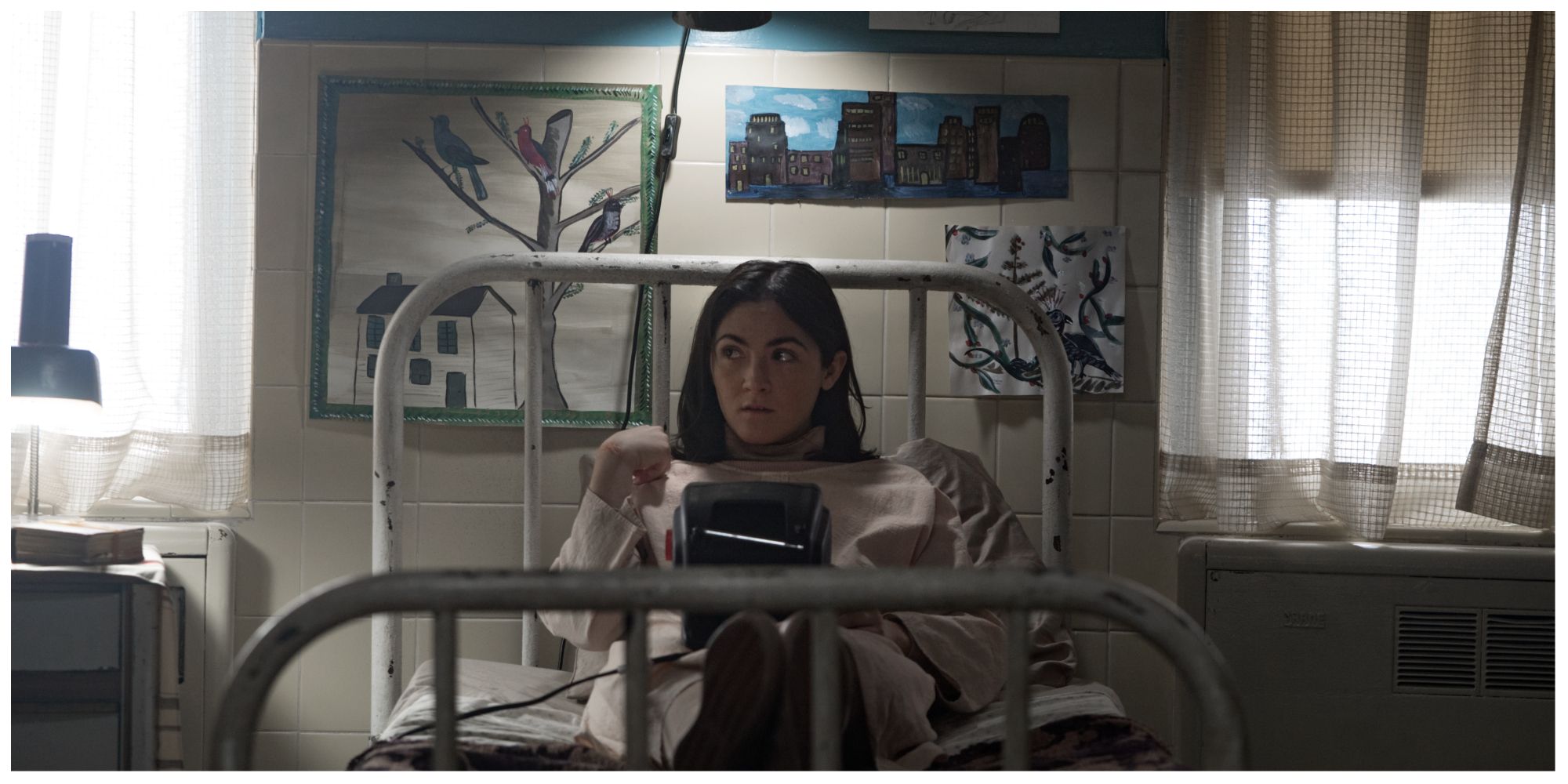 Esther from Orphan: First Kill sat up in bed