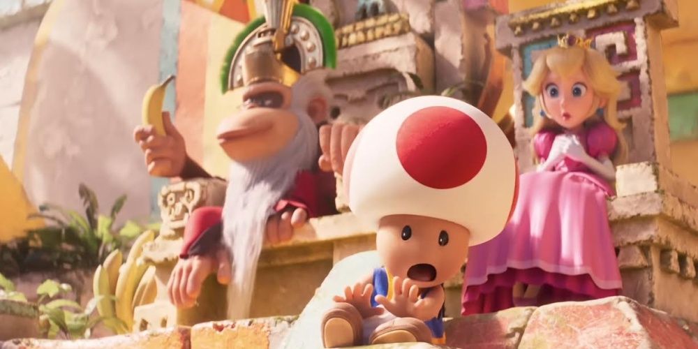 cranky kong with princess peach and toad in super mario bros movie