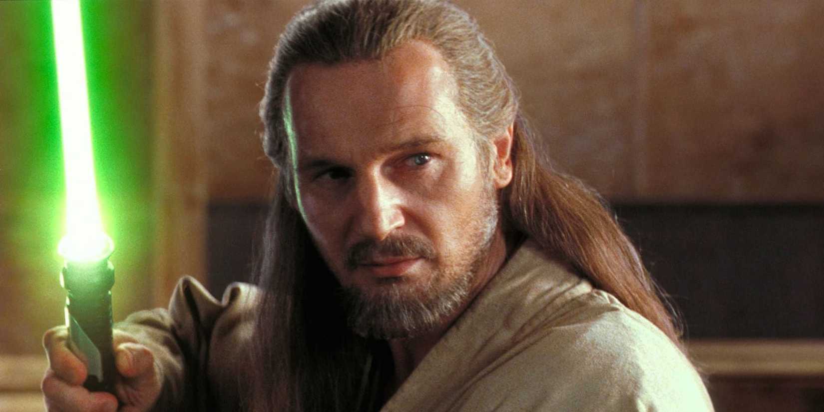 Qui Gon Jinn wields his lightsaber in Star Wars: Episode I - The Phantom Menace.