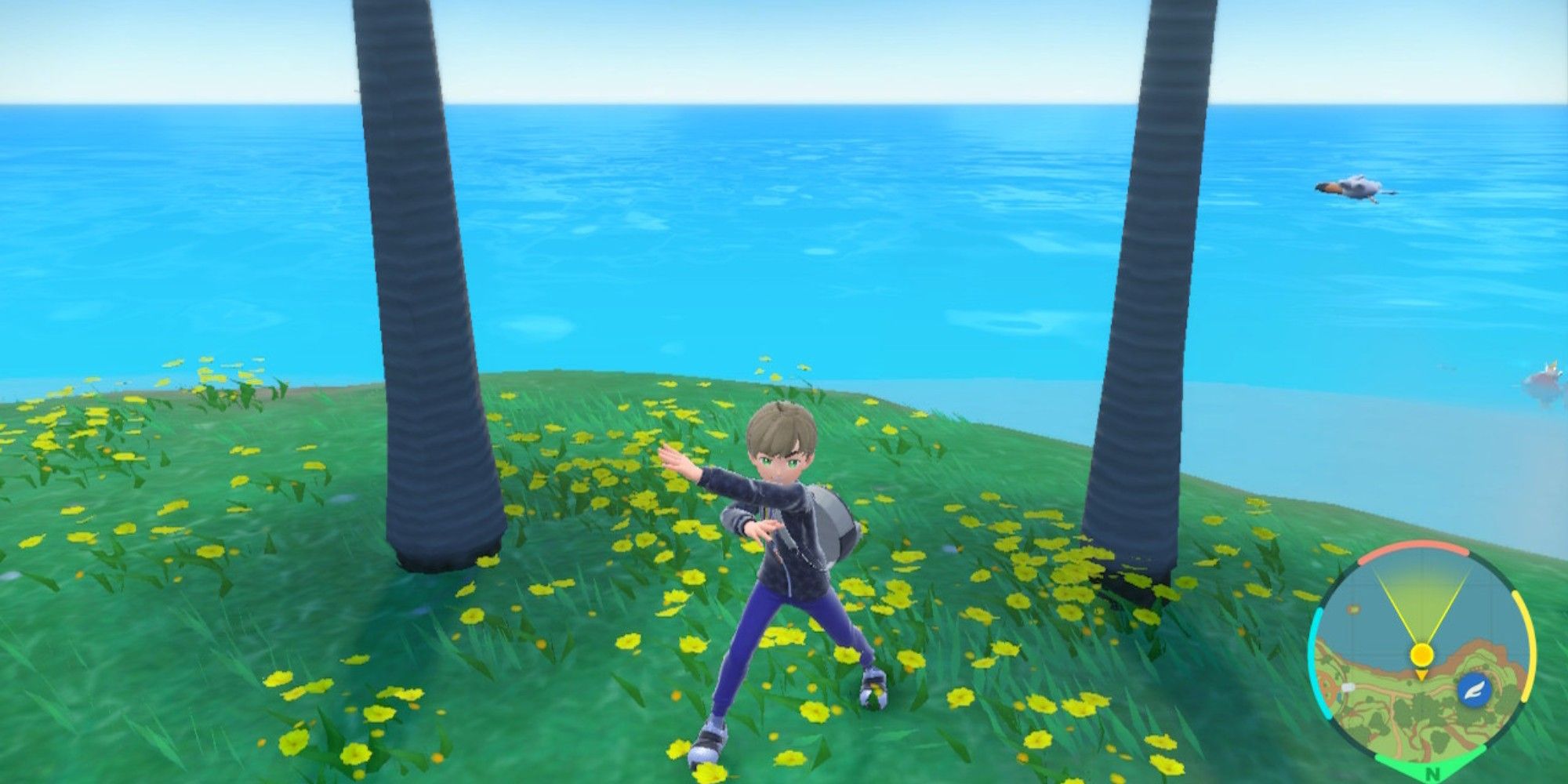 the player posing on a small island between trees with the ocean behind them