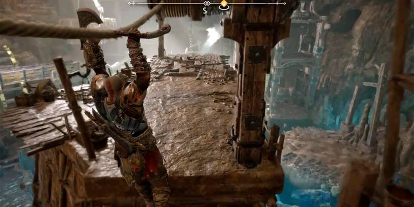 kratos sliding down a rope in god of war ragnarok