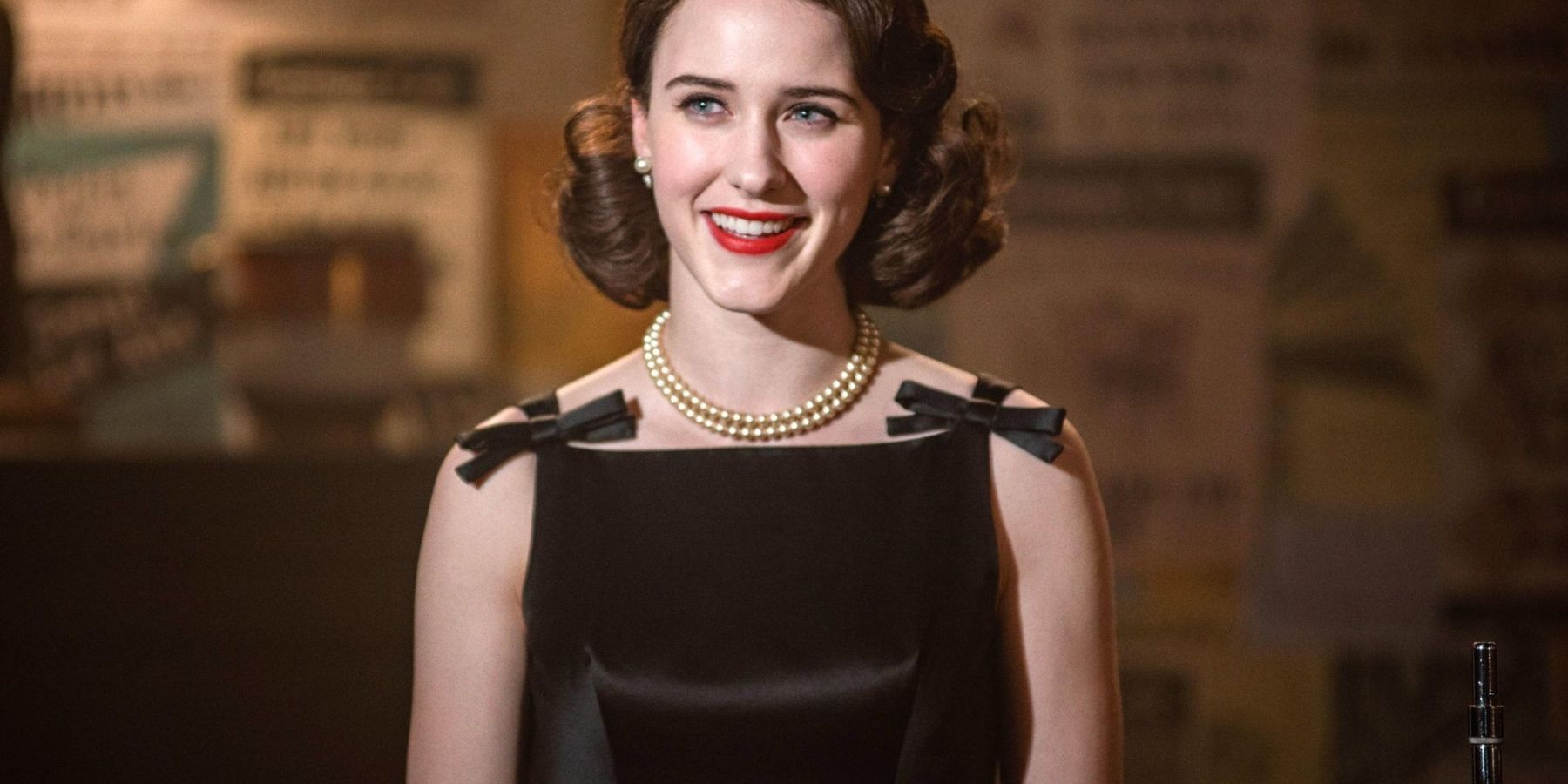 Midge smiling in The Marvelous Ms. Maisel