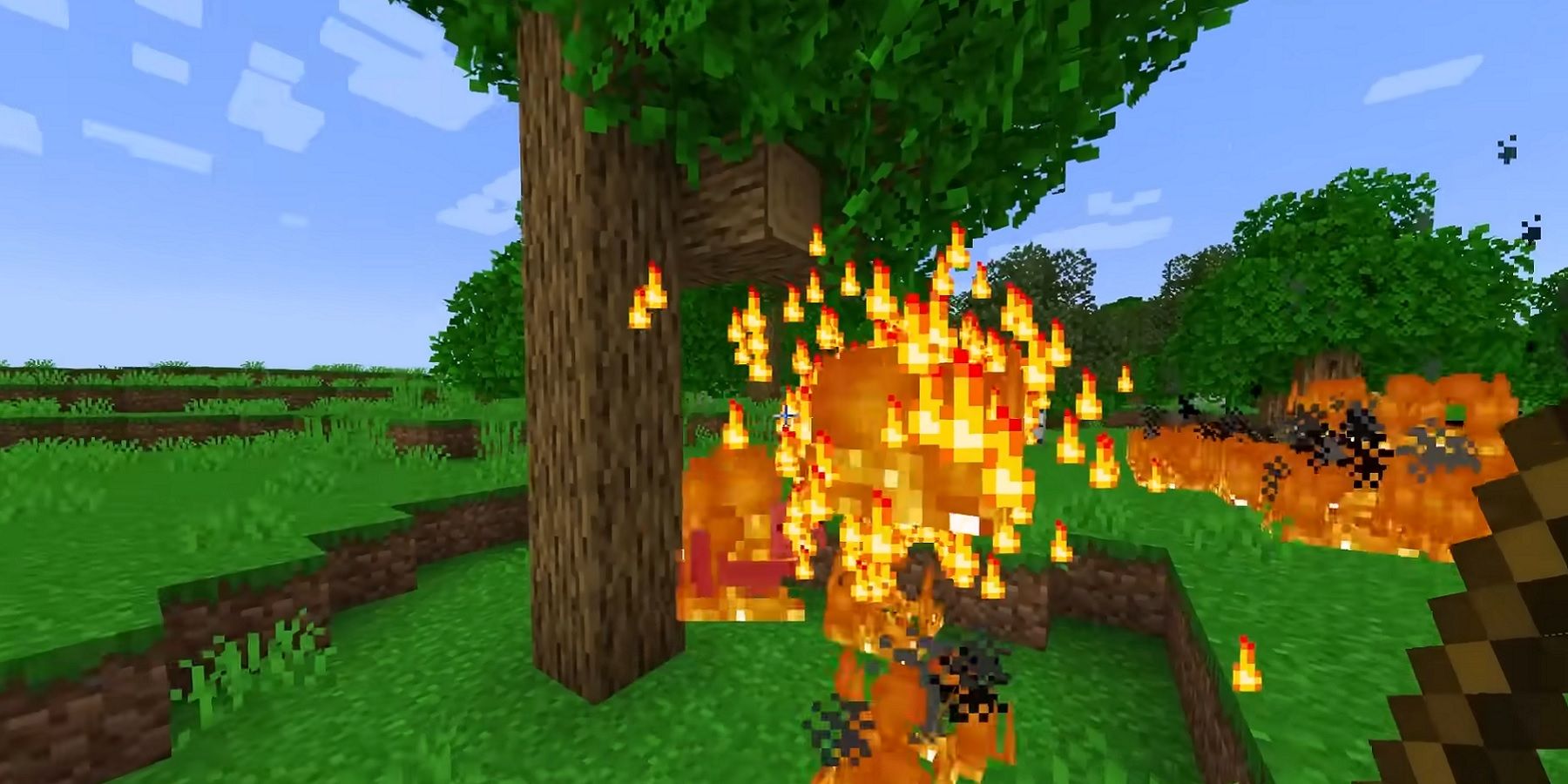 Image from Minecraft showing a tree about to be set on fire.