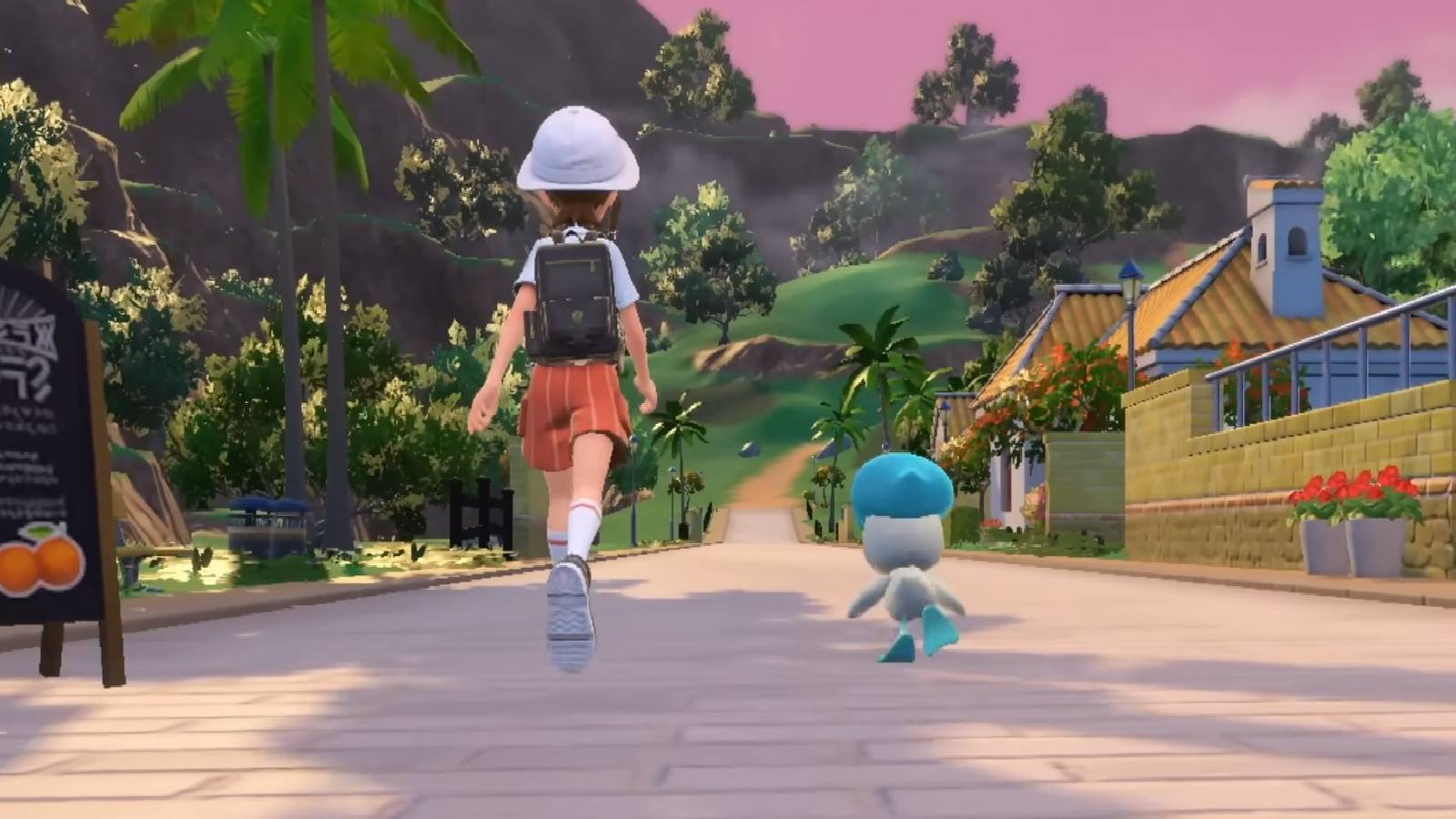 Trainer walking with starter Quaxly in Pokemon Scarlet and Violet